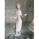 LLADRO FIGURINE OF A WOMAN WITH GLOBE AND BOOKS