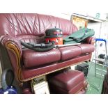 THREE SEATER A TWO SEATER SOFA AND FOOT STOOL IN BURGANDY FAUX LEATHER