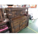 OAK COURT CUPBOARD WITH DECORATIVE CARVING