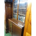 MAHOGANY GLAZED BOOKCASE, THE BASE WITH TWO DOORS AND COMPARTMENTED INTERIOR