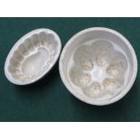 TWO SMALL PORCELAIN BLANCMANGE OR PATE MOULDS, THE SMALLER INDISTINCTLY MARKED COPELAND