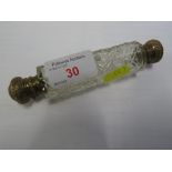 CLEAR CUT GLASS DOUBLE-ENDED SCENT BOTTLE WITH GILT BRASS MOUNTS, BOTH STOPPERS PRESENT, LENGTH 14.