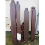 TWO UNASSEMBLED STAINED WOODEN GARDEN BENCHES WITH LABEL OF DEVON CRAFT OTTERY ST MARY