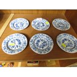 SIX SMALL DECORATIVE PLATES WITH BLUE AND WHITE FLORAL PATTERN, IMPRESSED MARKS AND CROSS SWORDS