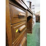 A SUBSTANTIAL EARLY 20TH CENTURY OAK OFFICE DESK WITH NINE DRAWERS