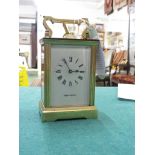 A MAPPIN AND WEBB GLASS CASED CARRIAGE CLOCK WITH KEY