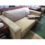 TWO-SEATER SOFA IN BEIGE UPHOLSTERY