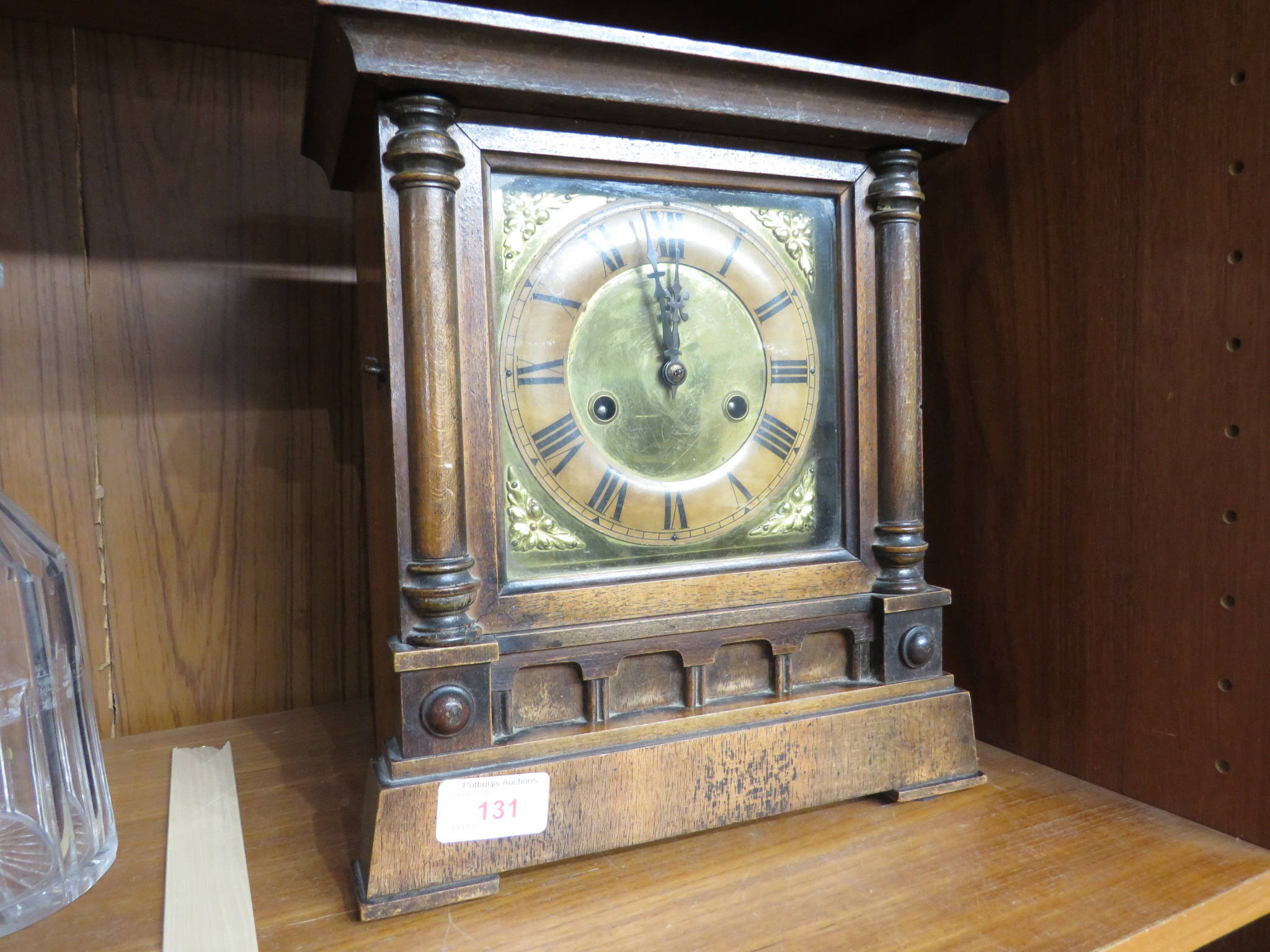 MAHOGANY CASED FOURTEEN DAY STRIKING CLOCK WITH GERMAN MOVEMENT