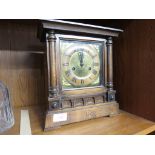 MAHOGANY CASED FOURTEEN DAY STRIKING CLOCK WITH GERMAN MOVEMENT