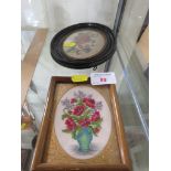 TWO SMALL FRAMED AND GLAZED NEEDLEWORKS OF FLOWERS