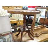 MAHOGANY VENEER OVAL WINE TABLE ON FOUR FEET