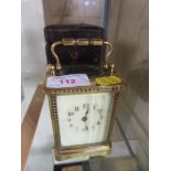 BRASS CARRIAGE CLOCK WITH FITTED LEATHER CLAD CARRY CASE