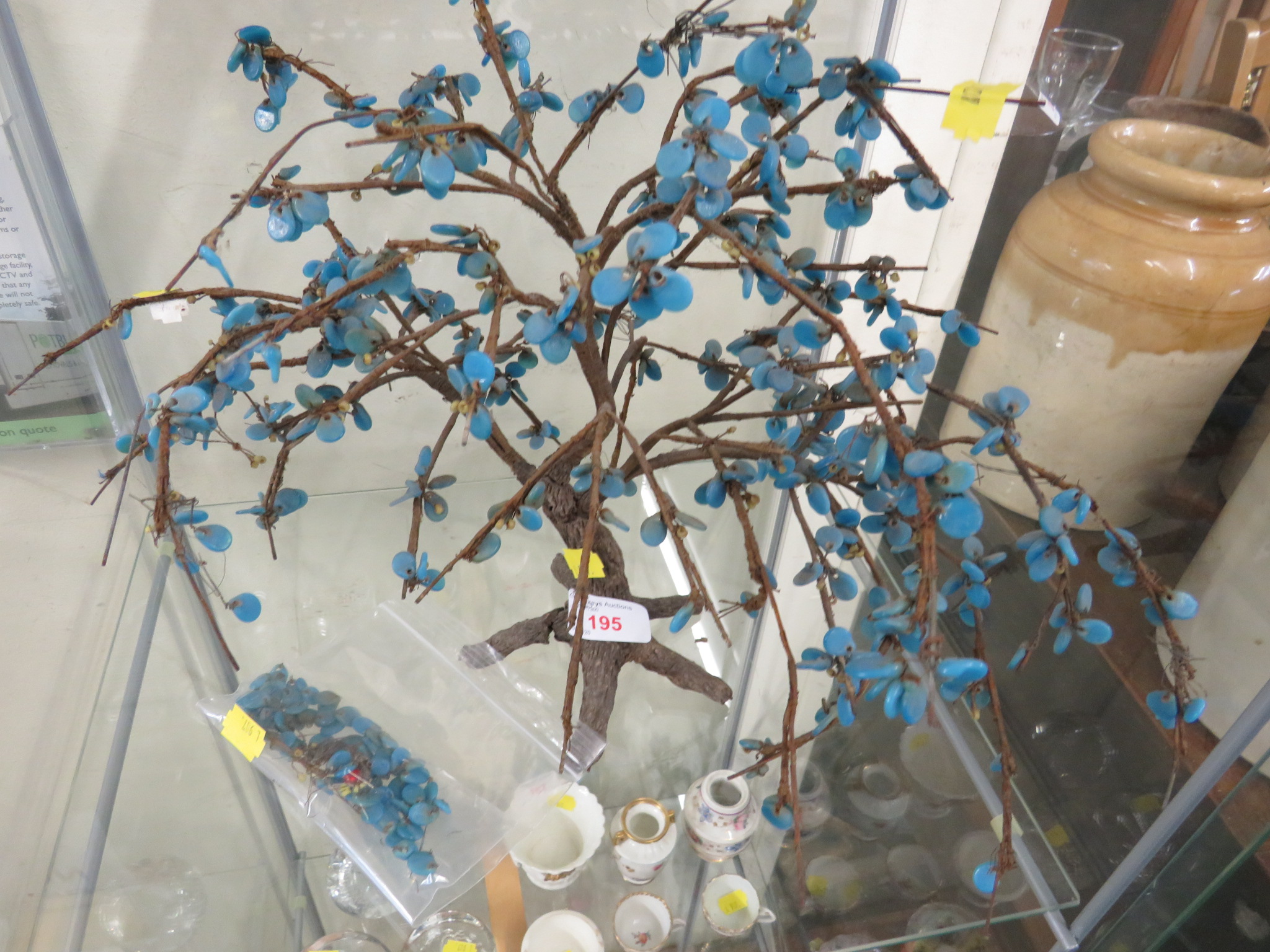 DECORATIVE ORNAMENTAL TREE WITH BLUE GLASS LEAVES AND GLASS BEAD FRUIT