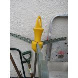 A YELLOW OUTDOOR CLOTHES HANGER WITH EXTENDABLE ARMS AND LEGS (A.F)