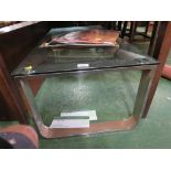 GLASS TOPPED COFFEE TABLE ON CHROMED METAL SECTIONAL SUPPORTS