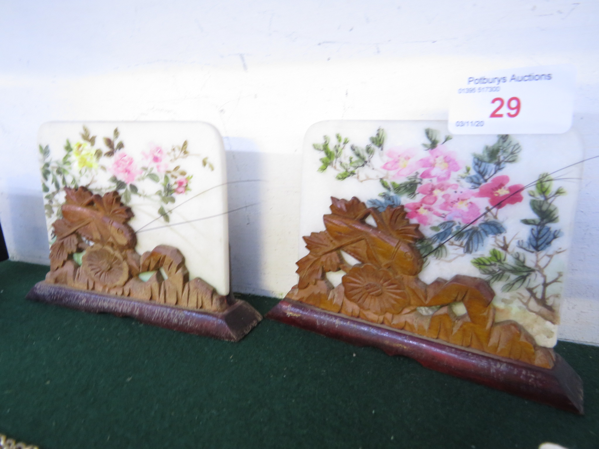 PAIR OF MINIATURE CHINESE STYLE TABLE SCREENS, THE STONE PANELS PAINTED WITH FLOWERS, THE WOODEN