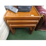 NEST OF THREE TEAK TABLES WITH GLASS TOPS