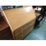 NATHAN LIGHTWOOD BUREAU WITH FIVE DRAWERS TO BASE, NO KEY