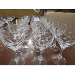 SET OF TWENTY FOUR WINE GLASSES WITH FACETED STEMS