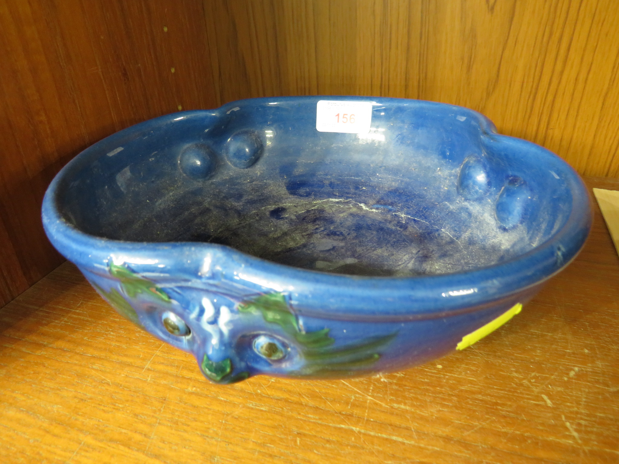 BLUE GLAZED DEVON POTTERY BOWL WITH CAT MASKS HEADS