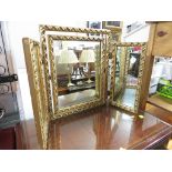 THREE-PART DRESSING TABLE MIRROR IN A GILT FRAME