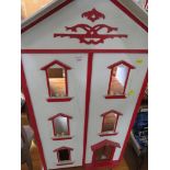 RED AND WHITE PAINTED WOODEN DOLLS HOUSE (A/F)
