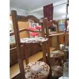 PAIR OF CARVED WOODEN THREE-TIER STANDS WITH FLORAL DECORATION