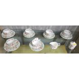 SIX MINTON HADDON HALL TEA CUPS SAUCERS AND SIDE PLATES, TOGETHER WITH MILK JUG AND LIDDED SUGAR