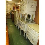 CREAM AND GILT PAINTED BEDROOM SUITE COMPRISING FIVE-DRAWER CHEST, PAIR OF THREE-DRAWER CHESTS ON