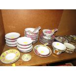 ONE SHELF OF FAR EASTERN CHINA BOWLS, CUPS, DISHES, RICE SPOONS, ETC (A/F)