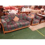 ERCOL LIGHT ELM FRAMED TWO-SEATER SOFA AND MATCHING ARMCHAIR AND FOOTSTOOL, WITH GREEN BLUE AND