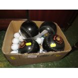 SET OF FOUR SIZE-THREE BOWLING WOODS AND GOLF BALLS