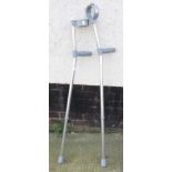 A PAIR OF ALUMINIUM CRUTCHES A/F