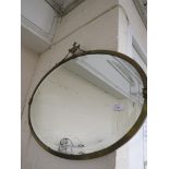 OVAL BEVELLED EDGE WALL MIRROR IN A BRASS FRAME
