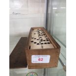 SET OF BONE AND EBONY DOMINOES IN WOODEN CASE