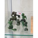 TEN CARVED GREEN STONE MINIATURE ANIMAL FIGURINES INCLUDING BEAR AND TORTOISE