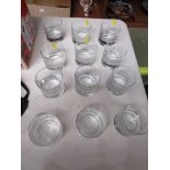 SET OF TWELVE GLASS TUMBLERS WITH SWIRLED DESIGN