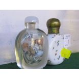 WHITE PORCELAIN SNUFF BOTTLE OF FLATTENED FORM ENAMELLED WITH COLOURED PETALS, BRASS LID (HEIGHT 7.