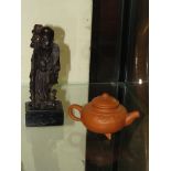 MINIATURE YIXING STYLE CHINESE TERRACOTTA TEAPOT, AND A CARVED CHINESE FIGURE