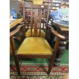 PAIR OF OAK FRAMED CARVER ARMCHAIRS WITH UPHOLSTERED SEAT PADS