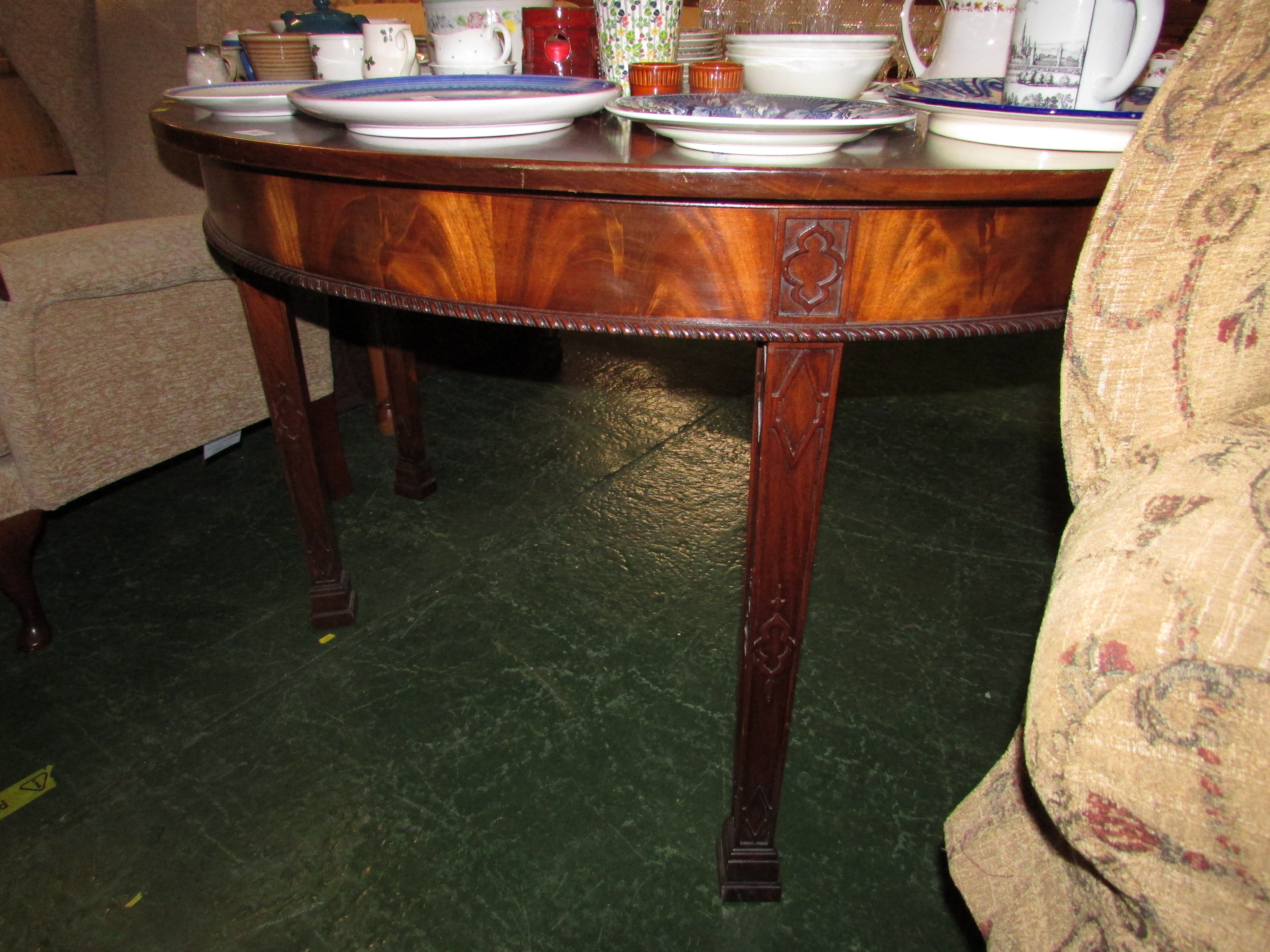 REPRODUCTION MAHOGANY DEMI-LUNE TABLE ON TAPERING LEGS