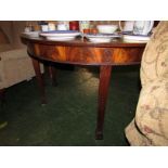 REPRODUCTION MAHOGANY DEMI-LUNE TABLE ON TAPERING LEGS