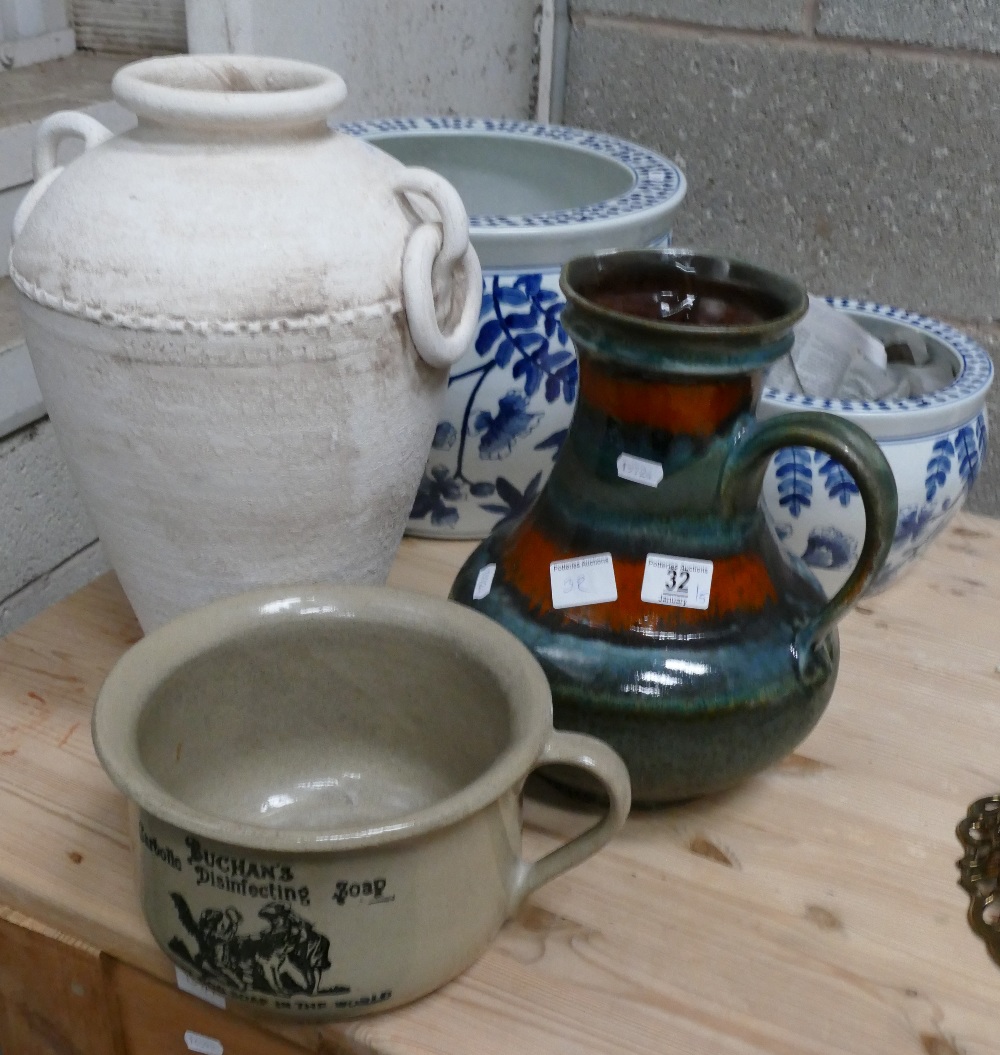 A quantity of large modern pots: including planters, vases,
