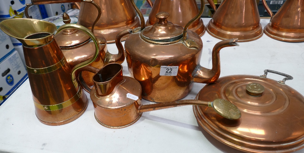 A collection of Copper items to include: kettles, bed warmers,