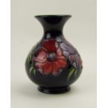 A Moorcroft vase decorated in the Anemone design, height 14cm.