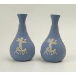 A pair of Wedgwood blue jasperware miniature bud vases: 8cm (2).