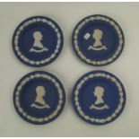 A collection of Wedgwood royal blue Royal commemorative dishes (4).