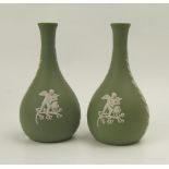 A Wedgwood pair of green jasperware small green vases: height 14cm.