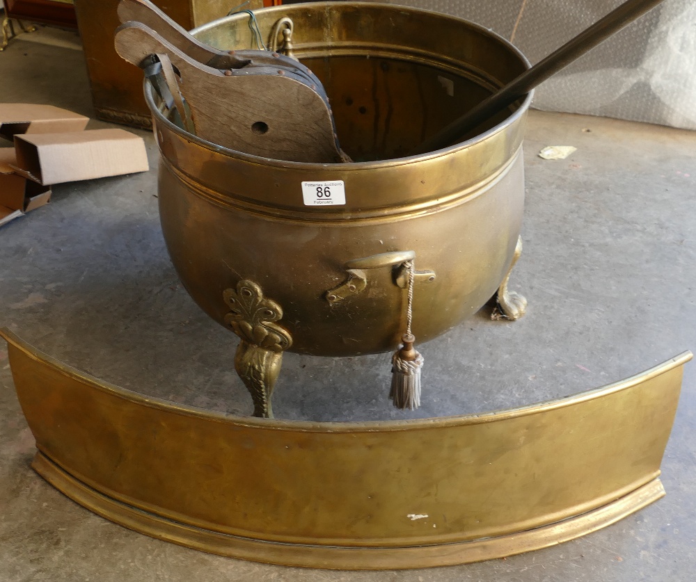 Large footed Brass Cauldron together with similar bellows and hearth part set etc.