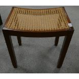 Mahogany cane seated dressing table stool: Mid 20th century, measuring 47.5cm x 36cm x 48cm high.